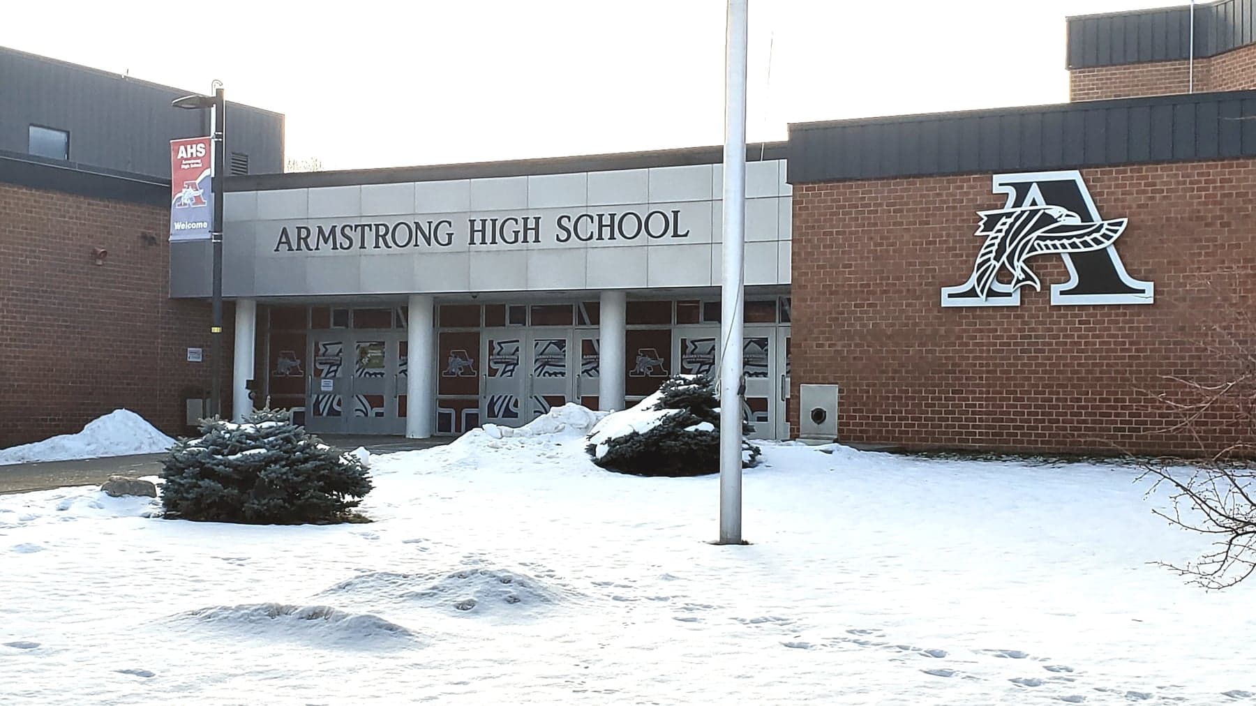 Snow outside the main entrance of Robbinsdale Armstrong High School in Plymouth, photographed in January 2026